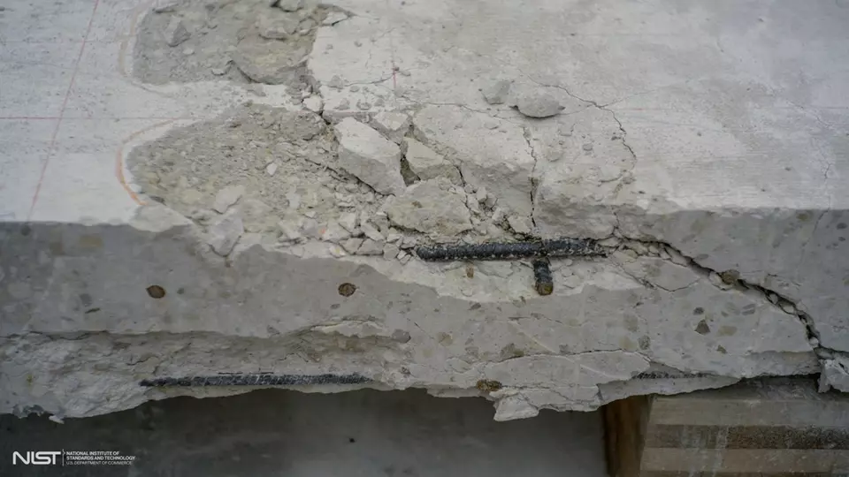 Photo of cracked white concrete slab