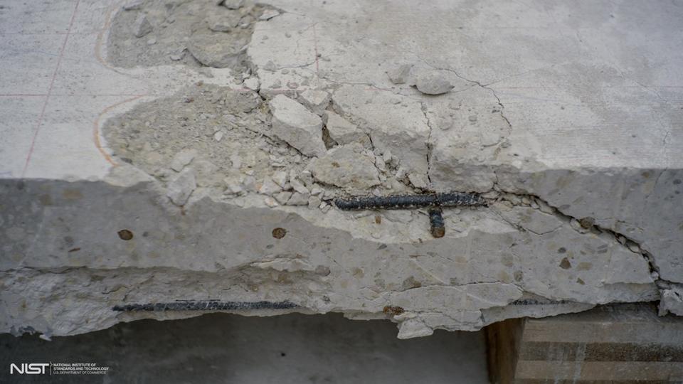 Photo of cracked white concrete slab