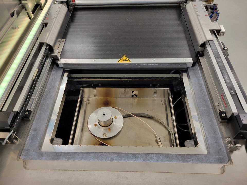 Sampling loading tray and Faraday cup for fluence monitoring