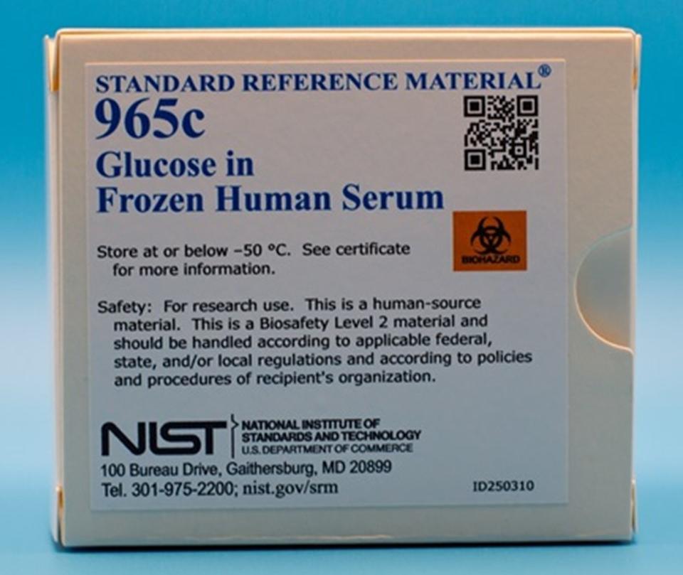 picture of a white box with a sticker label with a sticker label containing words Standard Reference Material 965c Glucose in Frozen Human Serum