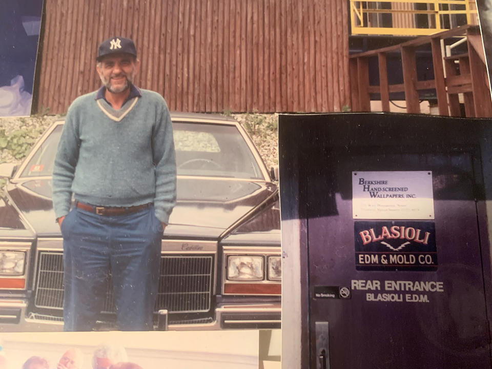 Family photo shows a man in a Yankees cap posing in front of a 1970s-era car. Inset shows sign on door reading: Blasioli EDM & Mold Co.
