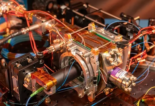 Metal parts and wiring make up the optical lattice clock. 