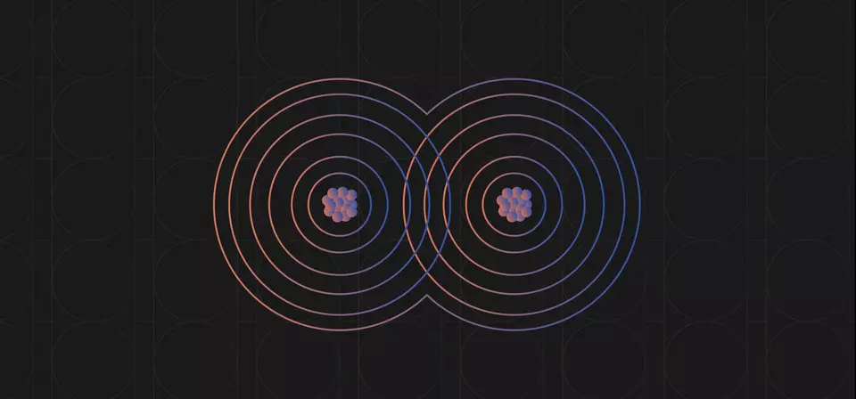 Diagram shows two atoms as sets of overlapping circles with nuclei in the centers. 