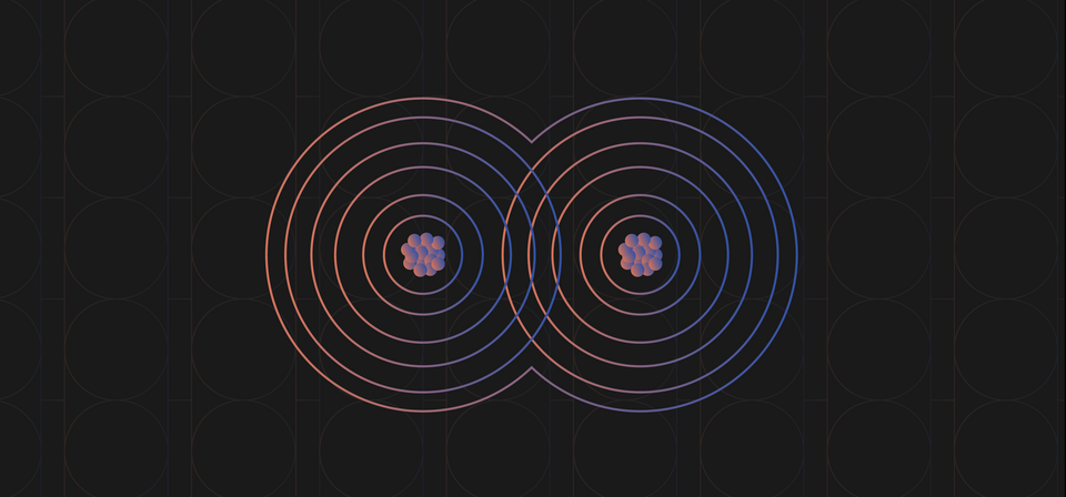 Diagram shows two atoms as sets of overlapping circles with nuclei in the centers. 