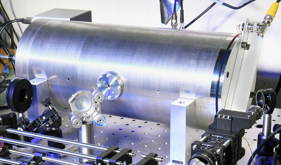 Combined acoustic resonator and optical cavity