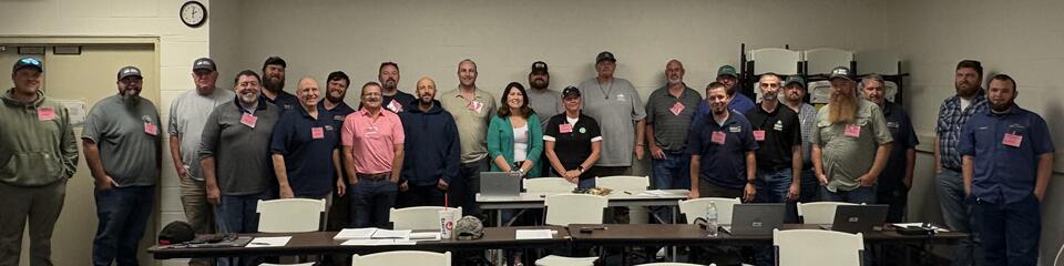 class photo of students in the Vehicle and Axle-load Scale training
