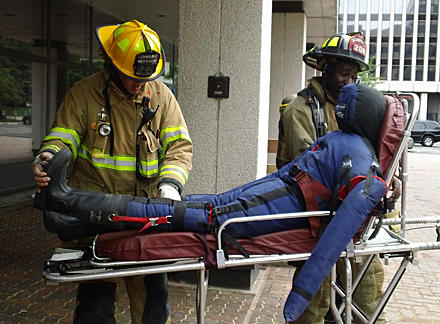 firefighters rescuing victim