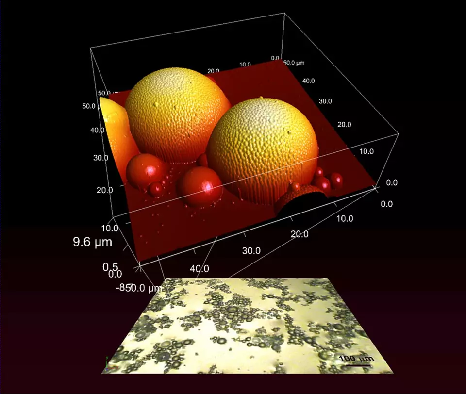 Bottom: Flat surface tilted up with pattern. Top: 3D spheres