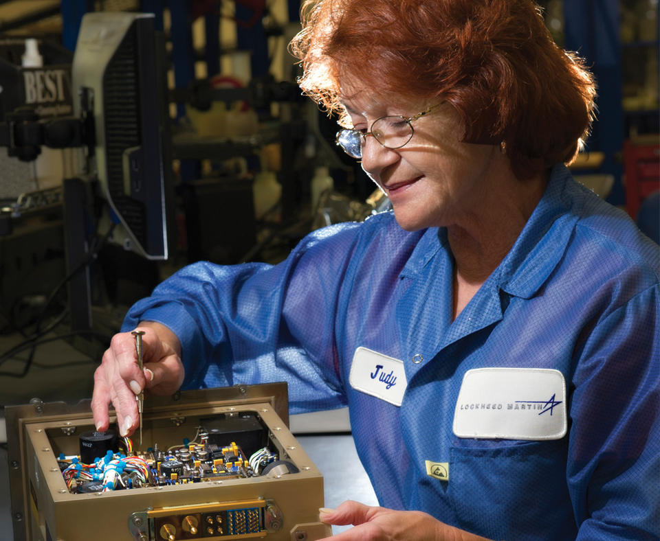 Lockheed Martin Missiles and Fire Control photo of employee working on  sensor system.