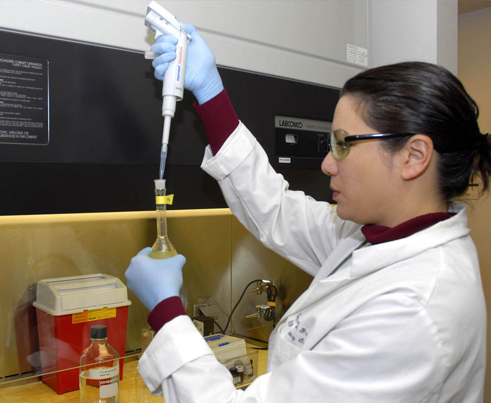 Department of Veterans Affairs - Cooperative Studies Program Clinical Research Pharmacy Coordinating Center photo of women doing reseach in a lab.