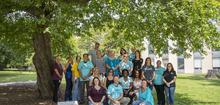 Group of people under a tree