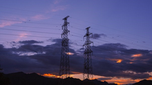 Image of power lines after dark