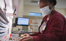 Wellstar Paulding Hospital 2020 Baldrige Award Recipient in Health Care employee working in the pharmacy.