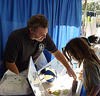 visitors to NIST booth and USA Science Engineering Expo