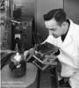 Ralph Orwick bending over a tungsten electrode welder