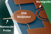 Orange disk resonator with waveguide to right and nanoscale probe to left.