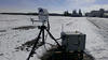 A  laser scanner monitors a field near Ft. Wayne, Indiana, for carbon dioxide leaking from underground.