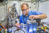 Picture of the sample area of the NIST X-ray Adsorbtion Fine Structure instrument, with NIST scientist Bruce Ravel, located at the National Synchrotron Light Source.