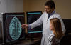 Memorial Hospital and Health Care Center doctor speaking to a woman patient about a scan.