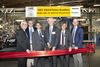 Group of executives performing ribbon cutting to open NIST beamlines at Brookhaven National Lab NSLS-II