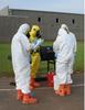 First responders collecting samples of the yeast surrogate material during a field exercise.  (Credit: NIST)