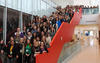 A large gathering of women on a staircase