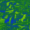 Microscope image shows blue and green jagged shapes