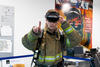 A firefighter wearing augmented reality glasses