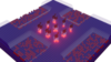 An oblique overhead view of a purple square with nine red dots arranged in a 3x3 array in the center of the square.