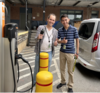Bryan Rezende (l) and Ben Tran (r) examining one of the AC Level 2 EV charging stations on the NIST Gaithersburg campus