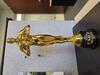 photo of golden figure trophy for CMUF Award