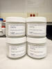 Four identical frosted-over jars are labeled 1947a, Great Lakes Fish Tissue.