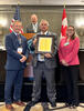 David Sefcik receiving the 2026 NCWM Distinguished Service Award
