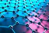 A stylized three-dimensional rendering of a molecular lattice, showing polished spheres joined by uniform rods in a repeating hexagonal grid. A cool blue to warm pink gradient and shallow depth of field emphasize the central structure against a blurred background.