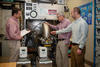 Engineering Laboratory staff discussing potential laboratory emergency scenarios as part of a safety tabletop exercise.